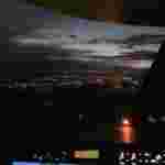 Феєрія вечірнього Львова з кабіни літака (відео, фото)