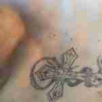 У Львові встановлюється особа померлого з численними татуюваннями (фото 18+)